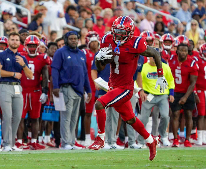 Florida Atlantic wide receiver LaJohntay Wester (1) looks for running room during a 42-20 victory over Monmouth at FAU Stadium on Saturday, September 2, 2023, in Boca Raton, FL